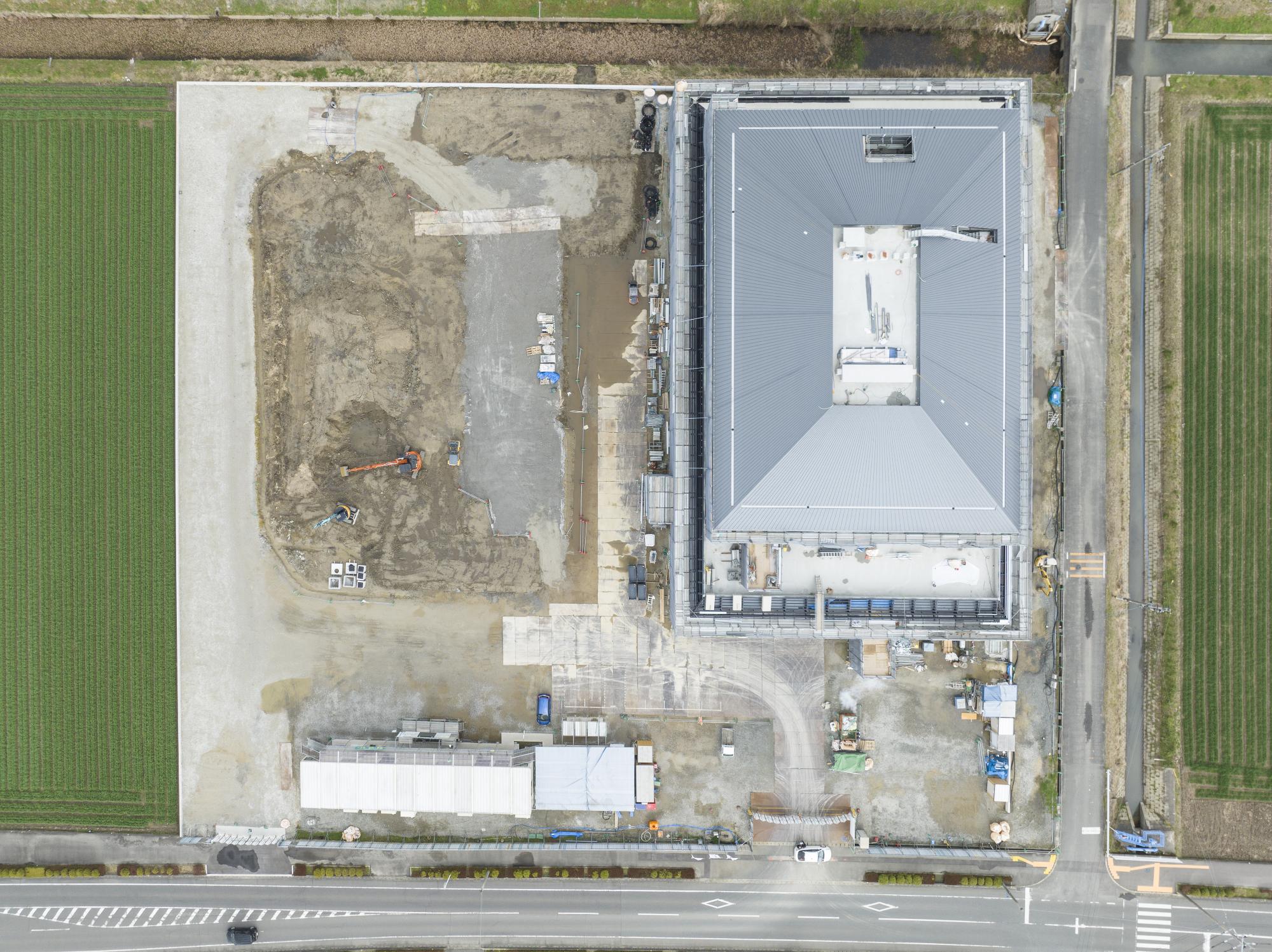 新庁舎建設令和8年2月末進捗状況写真敷地中央上空より